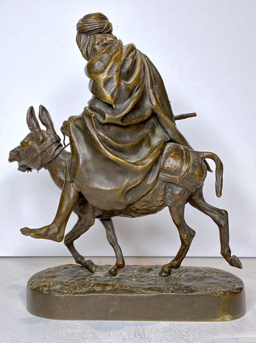 Une promenade à dos d'âne par la statue de bronze arabe russe Lanceray